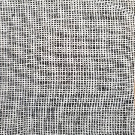 Gaia linen fabric with black, white and ecru weft