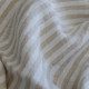 Washed linen fabric with white and ecru vertical stripes