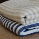 Washed linen fabric with white and ecru vertical stripes